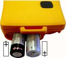 The instrument utilises two IEC LR06/AA-size batteries. The use of alkaline batteries is recommended. The polarity of the batteries is illustrated in the picture on the right.