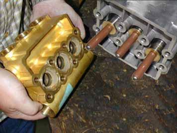 Carefully pull out the cylinder head using both hands.