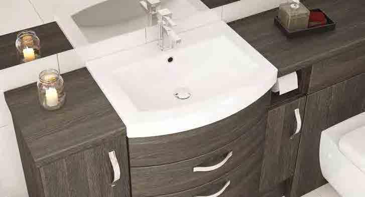 Basin units with drawers elongate a run of furniture and a handy toilet roll holder is a great finishing touch. The balmy tones of this finish make it great for warming up medium to large bathrooms.