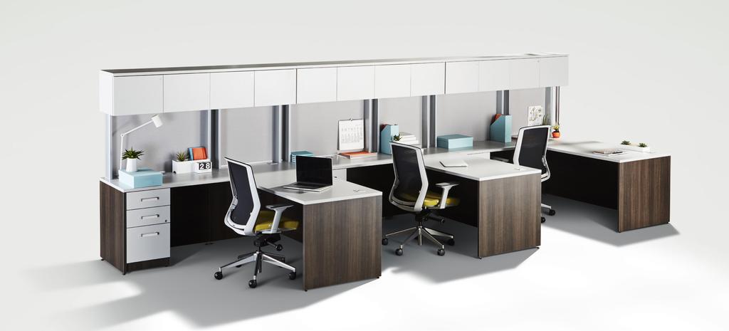 Low partitions and transaction tops promote the sharing of ideas, while extension worksurfaces provide a location for impromptu meetings. Organization above.