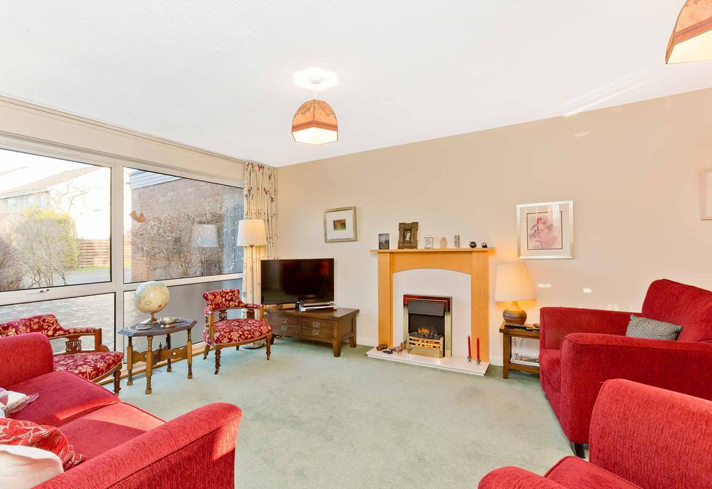 PROPERTY DESCRIPTION Characterised by an appealing semi-open-plan layout, a southwest-facing rear garden and off-street parking for up to four cars, this four-bedroom linked-detached house offers a