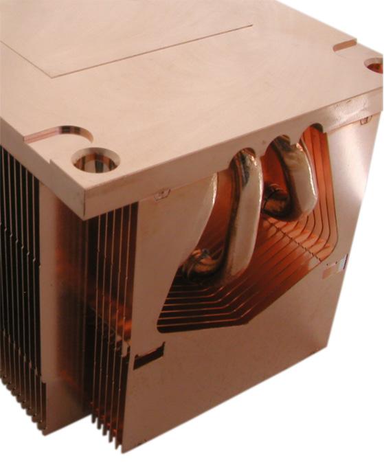 Using simple tooling (like a smooth faced vice), it is possible to flatten heat pipes to lower the profile and increase contact area of the heat pipe surface.