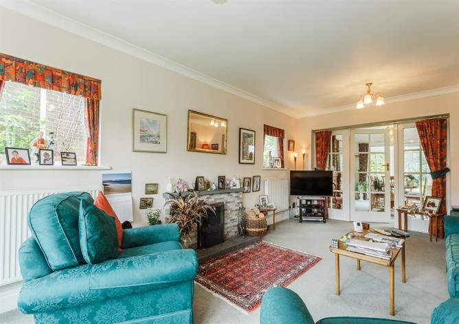 Located in this quiet and leafy street the property has a light and airy feel and benefits from three reception rooms, conservatory, kitchen/diner with appliances, large utility room and a downstairs