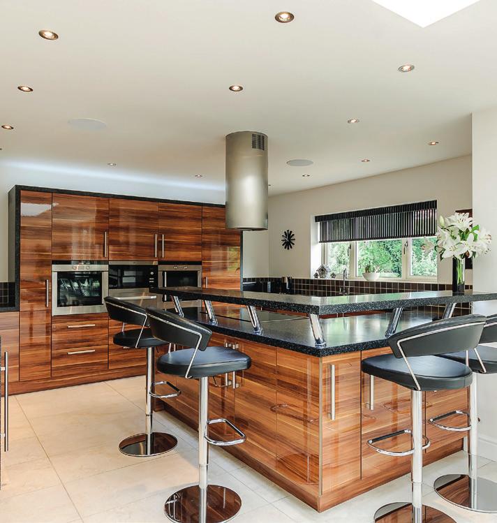 The open plan kitchen and breakfast room with its range of
