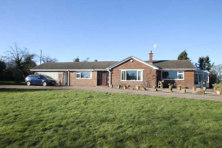 . Pentre Mere, Duddleston Heath, Ellesmere, SY12 9LJ A substantial detached bungalow set in generous gardens extending to approximately half an acre requiring general modernisation and upgrading.