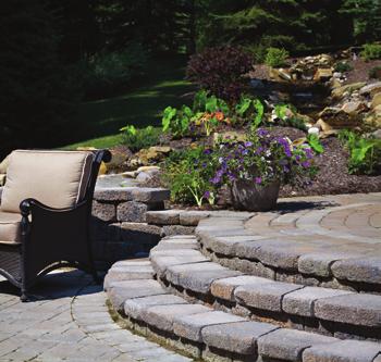 Belgard s paving products, such as the Mega-Bergerac pavers shown here, are engineered to withstand vehicular traffic, making them a beautiful and durable choice for driveway applications.