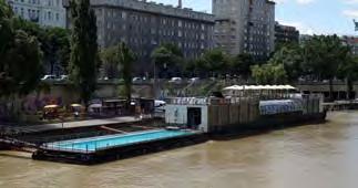 Viennas Badeschiff combines two boats including a pool, a sun deck, a restaurant and a