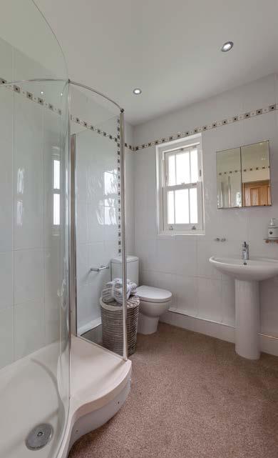 Summerley Top A Property of Exceptional Quality, Catering for a Variety of Hobbies and Interests Jack and Jill Shower Room Having a side facing UPVC double glazed obscured sash window, recessed