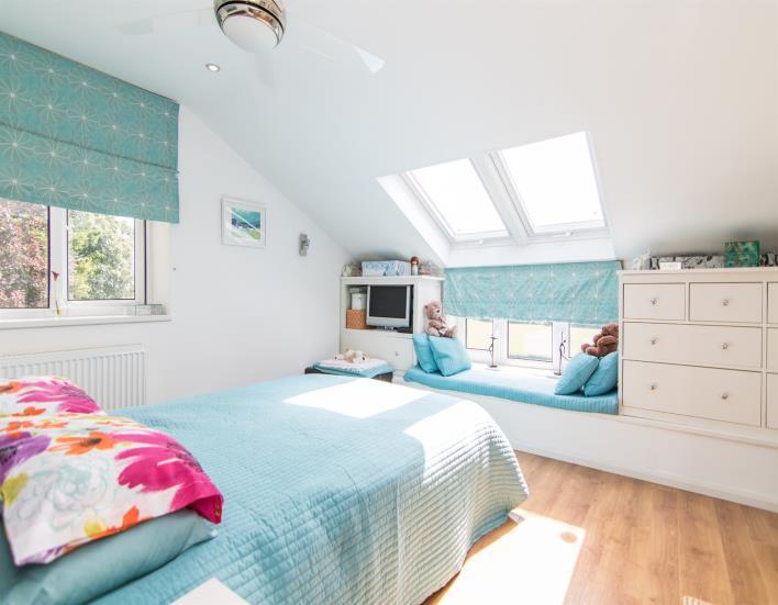 Bedroom Five 10' 3" x 9' 1" ( 3.12m x 2.77m ) Laminate wood flooring, radiator, PVC double glazed window to front with wonderful elevated panoramic views across green fields and rolling countryside.