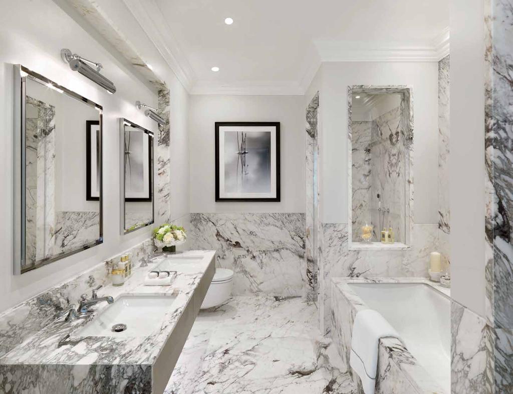 The spacious master bathroom has a bespoke double vanity,