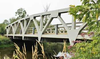 The bridges included in Appendix F illustrate some of the municipal efforts that have been made to design contemporary structures that reflect historic bridge building aesthetics.