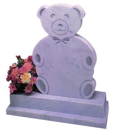 CM06 Marble. A headstone shaped as a Teddy Bear which sits on a base.