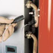 . Remove the electrical connector from the overheat thermostat