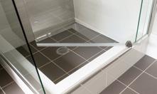 Caroma semi inset vanity basins and chrome mixer taps to bathrooms.