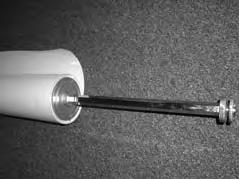 Load a roll of pressure sensitive film to the top film shaft (Figure ).