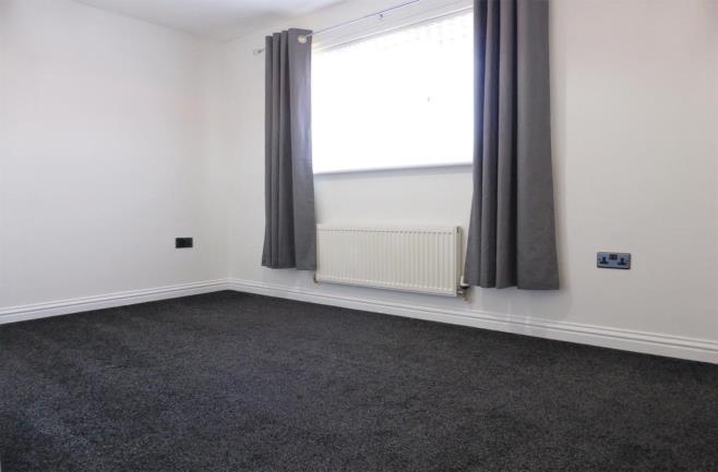 41m (7' 11") A good sized double bedroom, comprising built in wardrobe, wall mounted radiator and