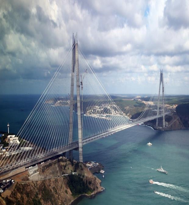 tower is 110 m. The deck of bridge at the mid-span is 64 m high from the mean sea level. With the side span length of 210 m at the two continents, total length of the bridge is 1510 m.