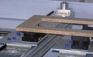 The vacuum is supplied through holes located above the grooves.