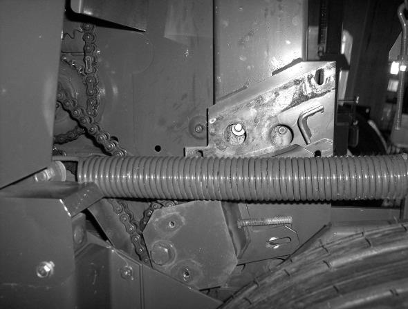 Before drilling the hole make sure hole is accessible from opposite side of chamber to tighten down mounting hardware and to install moisture harness (Figure 3).