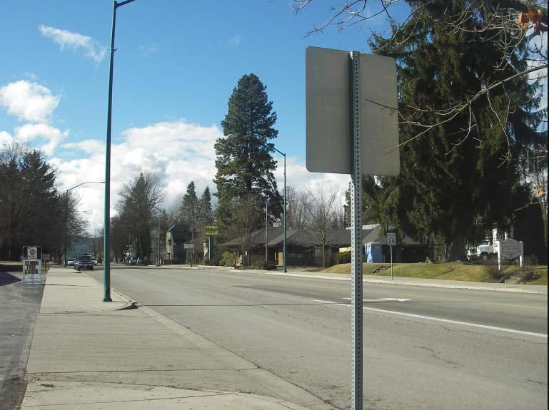 J. Applicant: Thomas G. Walsh Owner 1027 Sherman Avenue Coeur d'alene, ID 83814 K. Land uses in the area include residential - single-family, duplex, Multi-family and commercial sales and service. M. The subject property contains a dental office.