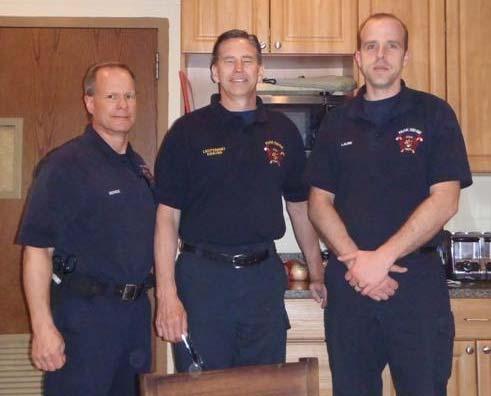 Pictured below with the crew is: (left to right) Deputy Chief Sorensen, Lieutenant Kevin Plach, Firefighter/Paramedics