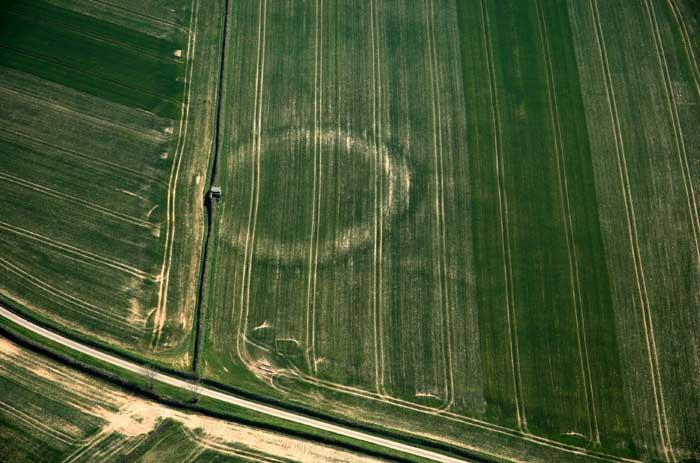 How we find the sites Many of the archaeological sites mapped by aerial archaeologists have been levelled by ploughing and are identified from the photos as cropmarks or soilmarks.