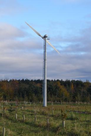during turbine erection (these can be removed or covered over during operation), underground cables connecting the turbines (buried in trenches, often alongside tracks), one or more anemometer