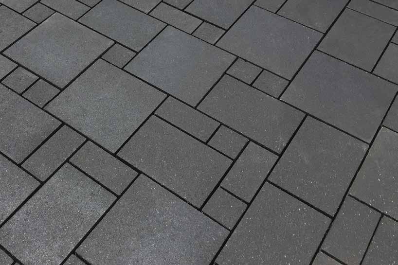PRECINCT A CLASSIC AESTHETIC Sharp-edge, expressed joint and random-sized pavers system that forms a French pattern.