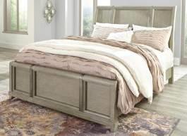 B732 Chapstone (Ashley Millennium HS Exclusive) Casual contemporary group made with hardwood solids, engineered board, and quarter cut ash veneers in a bisque gray color Washed finish is contrasted
