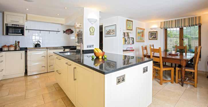 Kitchen/family room Description of property Lighthorne Rough is a fine family house with high quality fixtures and extensive use of oak joinery, which has been remodelled by the present owners to