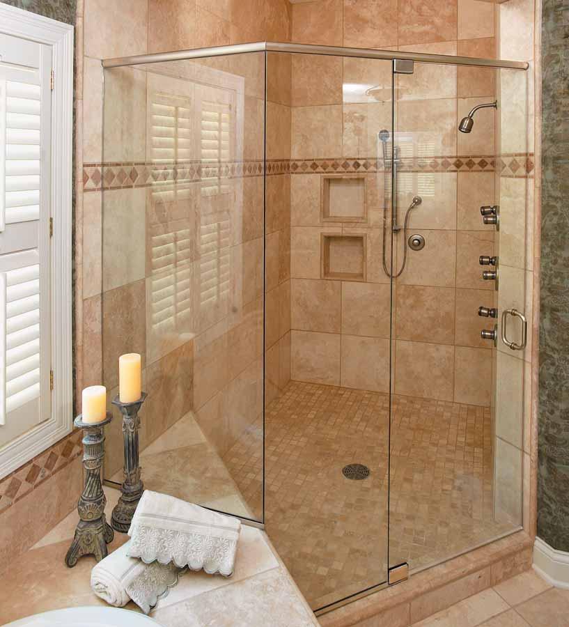 Within a brushed nickel header and u-channel, this shower features a traditional pull and prima hinges.