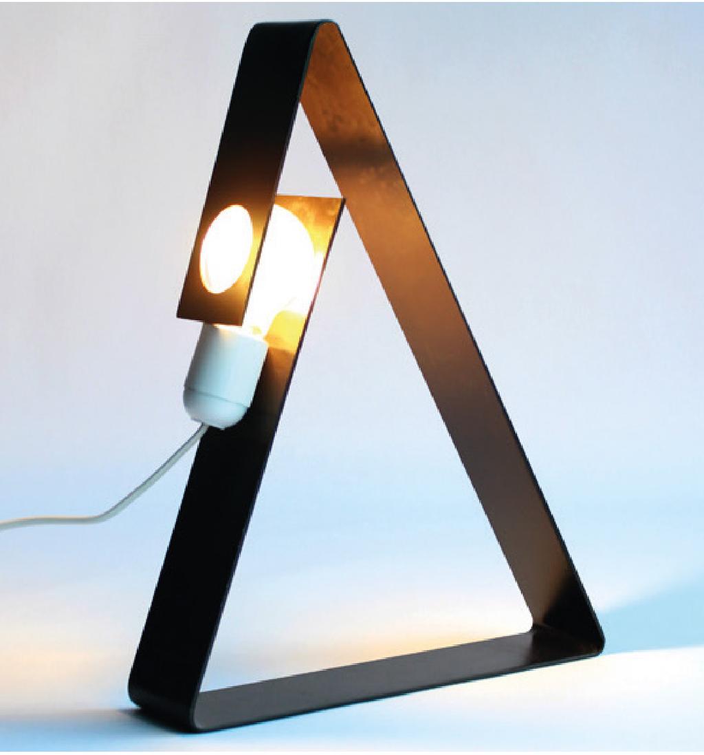 Trekant 2012 EXPERIENCE / Internship Eden Design Trekant is a lamp that creates a beautiful atmosphere in your room. Its design is geometric and minimalistic.