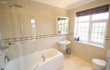 point, Wall and ceiling light points Library Area / Potential Bedroom Five En-Suite UPVC obscure double glazed leaded window to the rear Three piece suite comprising: Panelled bath with mixer tap,
