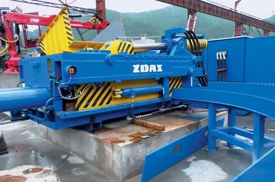includes a bale conveyer STATIONARY EQUIPMENT