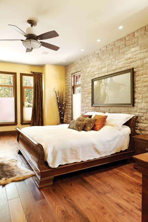 lighting. master bedroom, where the stone is slightly more angular, matching stone on the exterior of the home.
