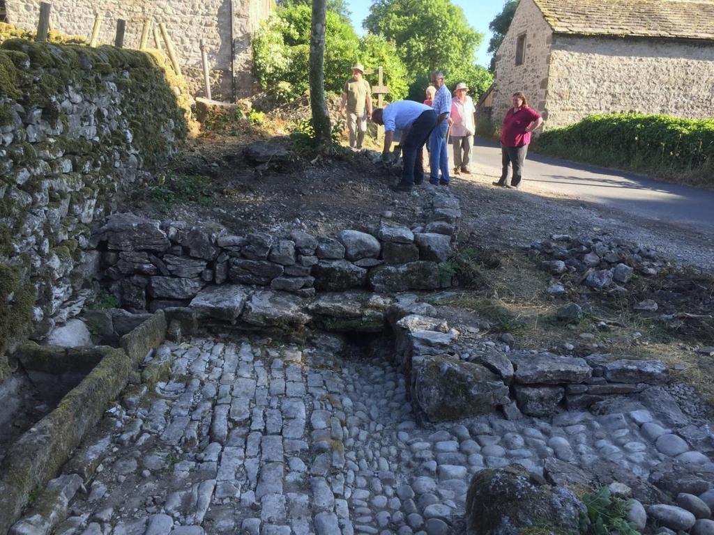The missing cobbling was replaced at this stage, using local river cobbles and cobbles found amongst the debris exposed by the excavator.