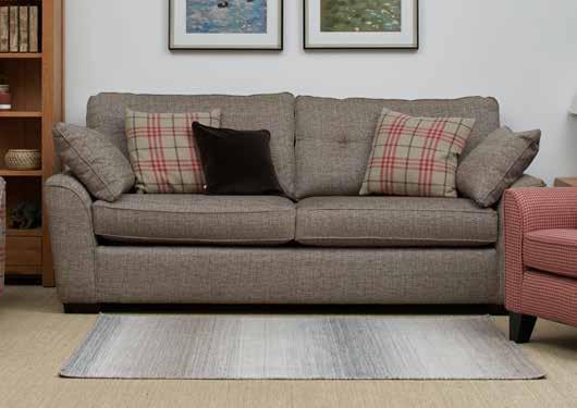 CRANBORNE SOFA This collection takes a modern twist on traditional furniture with its angular shapes and wooden