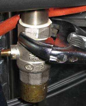 cable tie holding the hose in place Work the hose off the valve Unscrew the valve from the boiler exit Unscrew the