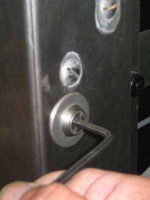 itself Undo the Allen screw holding the back of the door