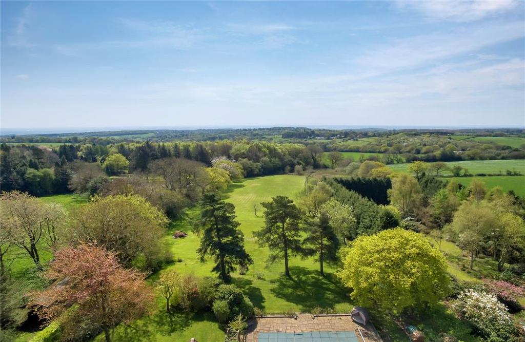 In all, a magnificent setting and a substantial property with outstanding uninterrupted views to the south.