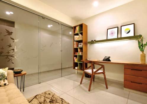 Finally, there is the immaculate study room which is actually a multi-purpose space encompassing the puja area as well. A sliding door helps to cover the puja section when needed.
