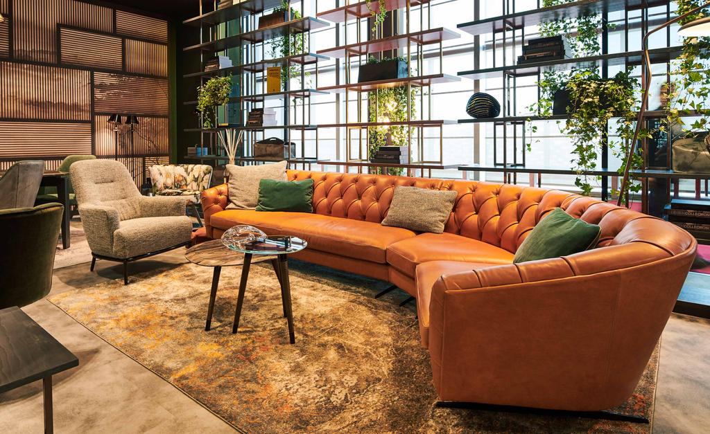 2 3 NEW KAP Borzalino design NEW KAP is the latest in the large family of sofas from BORZALINO; it links the traditional nature of artisan touches such as the button back, handmade using single