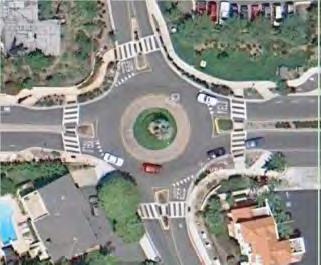 2.0 DEVELOPMENT PLAN Typical Roundabout Detail (see next page), illustrates a schematic design, although roundabouts in the