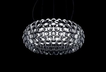 design Patricia Urquiola + Eliana Gerotto 2005 Resulting from the desire to create a precious and charming lamp like a pearl bracelet, accommodated with a focus on light weight and transparency