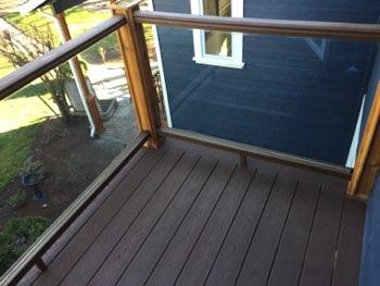 No visible flashing present above the deck header to prevent