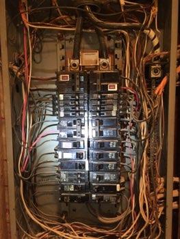 1. Location Materials: Located in the laundry room. Electrical 1 2. Electrical 200 AMP service, 4/0 Aluminum service entrance wires. Panel circuit breakers are not labeled and listed. 3.