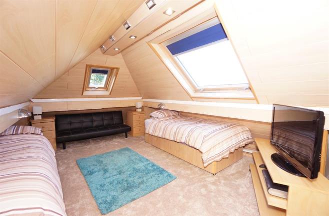 ON THE SECOND FLOOR GENERAL REMARKS OCCASIONAL ROOM 5.16m (16' 11") x 3.88m (12' 9") The room has side and rear facing velux roof lights where far reaching views can be enjoyed.