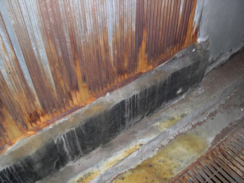 During a site visit, both AHU-S1 & S2 were found to have rusty coils and deteriorating interior insulation as seen in Figure 2.