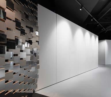 The space is presented like a story composed of chapters in the form of sculpted zones that showcase laminates.