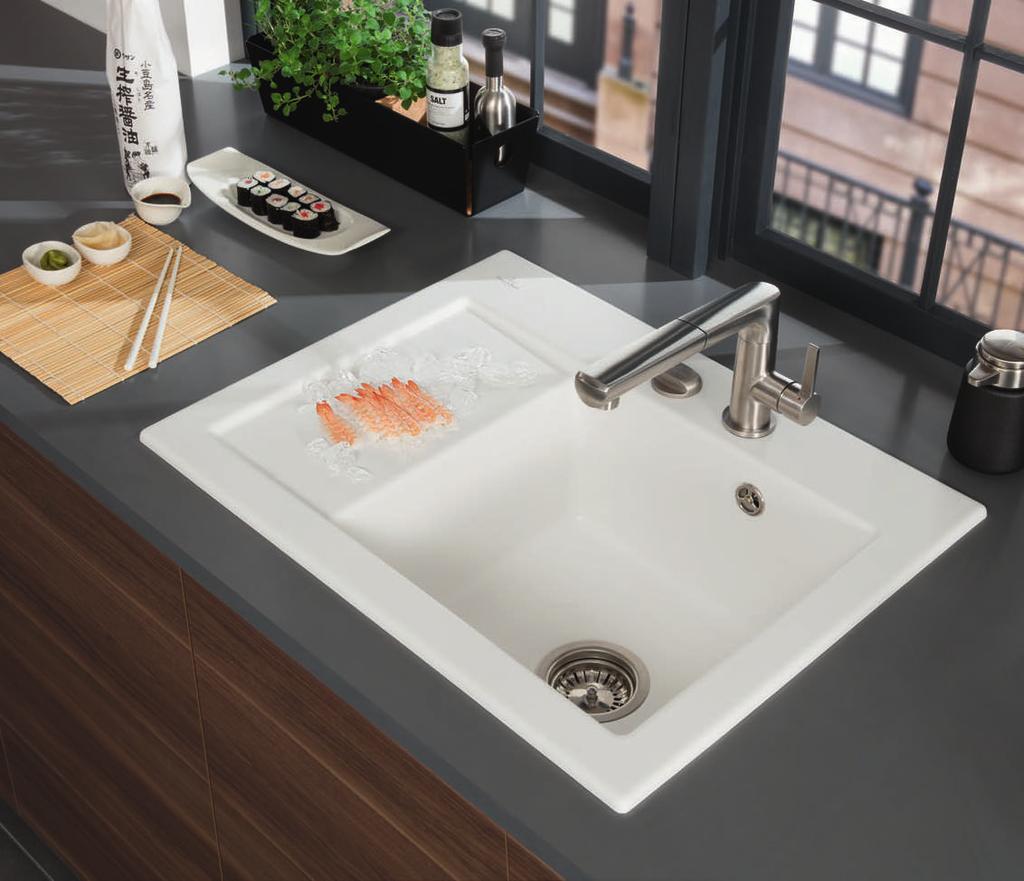 There is now a perfect solution for those who wish for a smaller sink but still like to use a draining area.